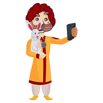 Rajasthani magician is taking selfie on mobile with rabbit