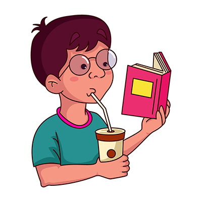 Indian boy reading book while drinking juice