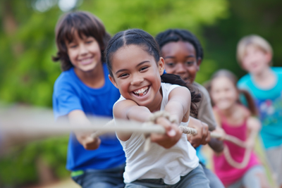Image of children playing tug of war