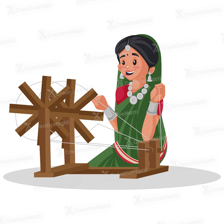 Indian Gujarati woman is working on a spinning wheel